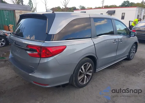 2021 Honda Odyssey Touring from USA, damaged, VIN 5FNRL6H87MB009491